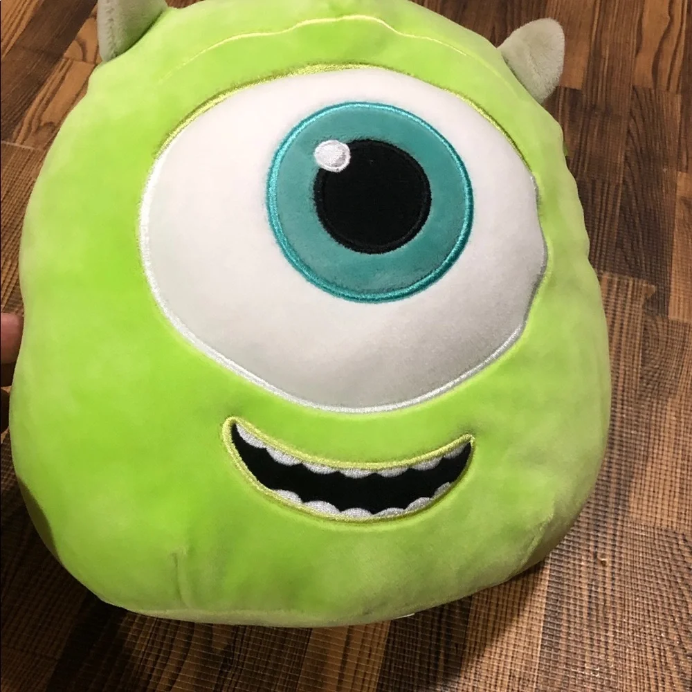 Disney Mike Wazowski Plush Pillow in Lime Green with Teal Eye.